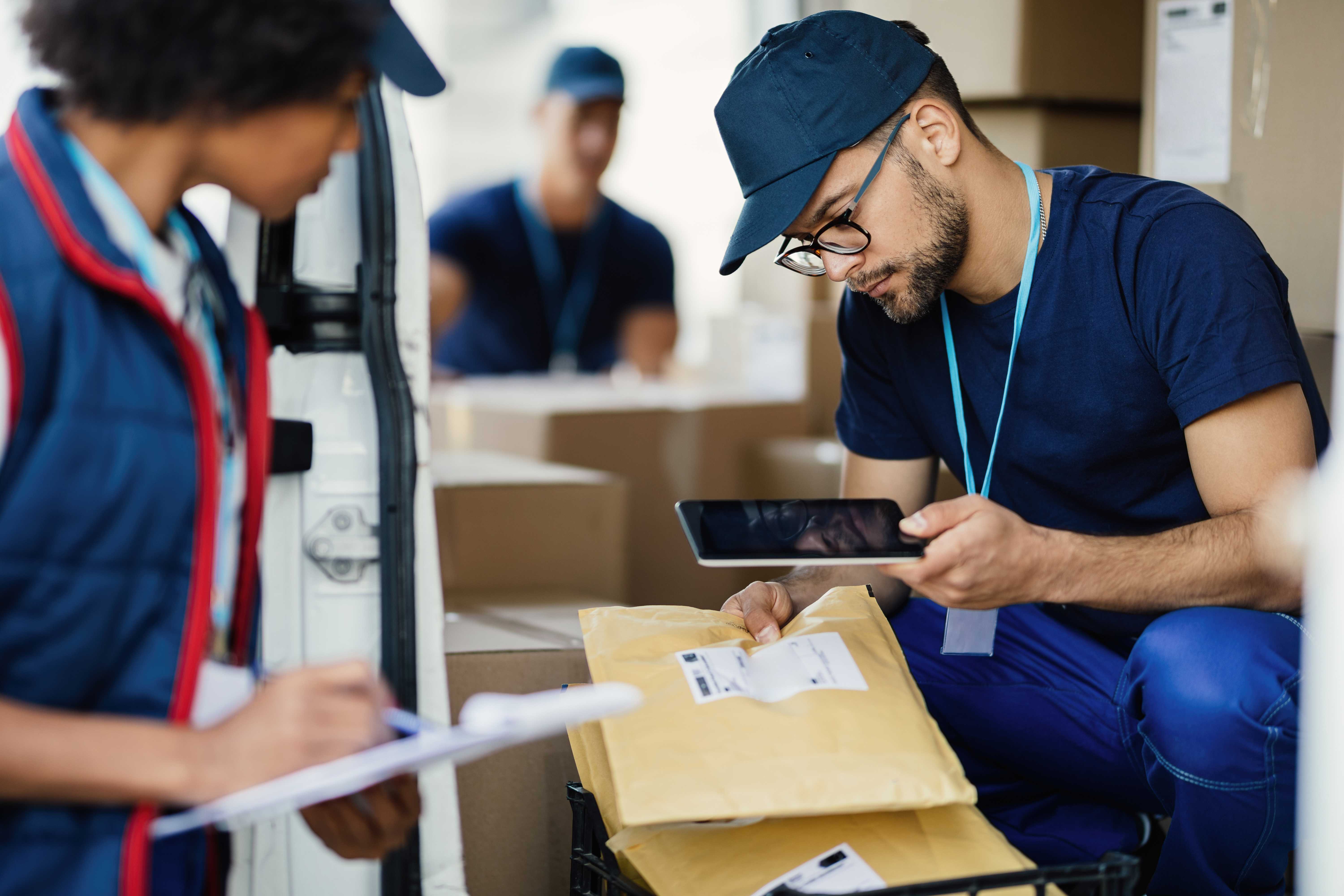 Couriers processing packages